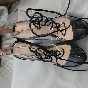 Ladies heels 👠. Shoes never worn and are see thru.